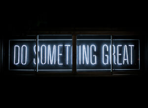"do something great" in white neon light